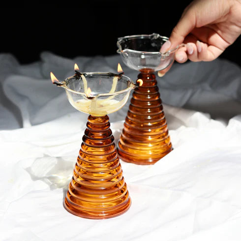 Two tall Glass Diya