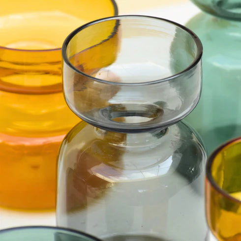 Close-up of colorful glass vases