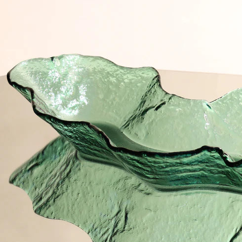 A moss green, glass bowl