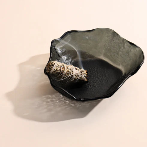 An ash grey lava glass bowl