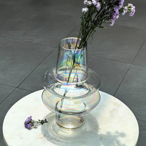 Iridescent glass vase with flowers 