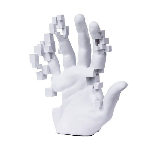 A white hand sculpture with abstract cube.