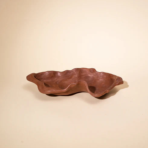 Two terracotta bowls with a floral pattern