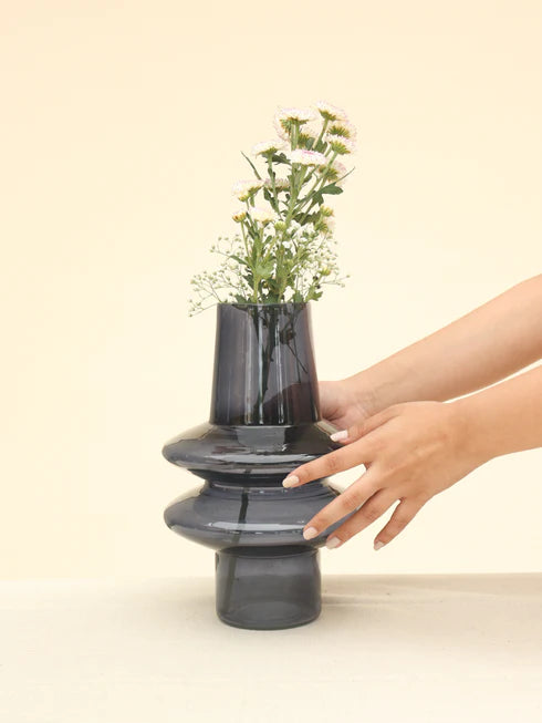 A slate grey glass vase 