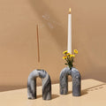 Two grey marble candle holders 